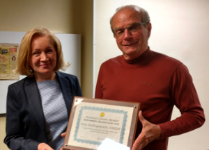 Aleks W3JAG presents Riley K4ZDH with a Lifetime Membership Certificate